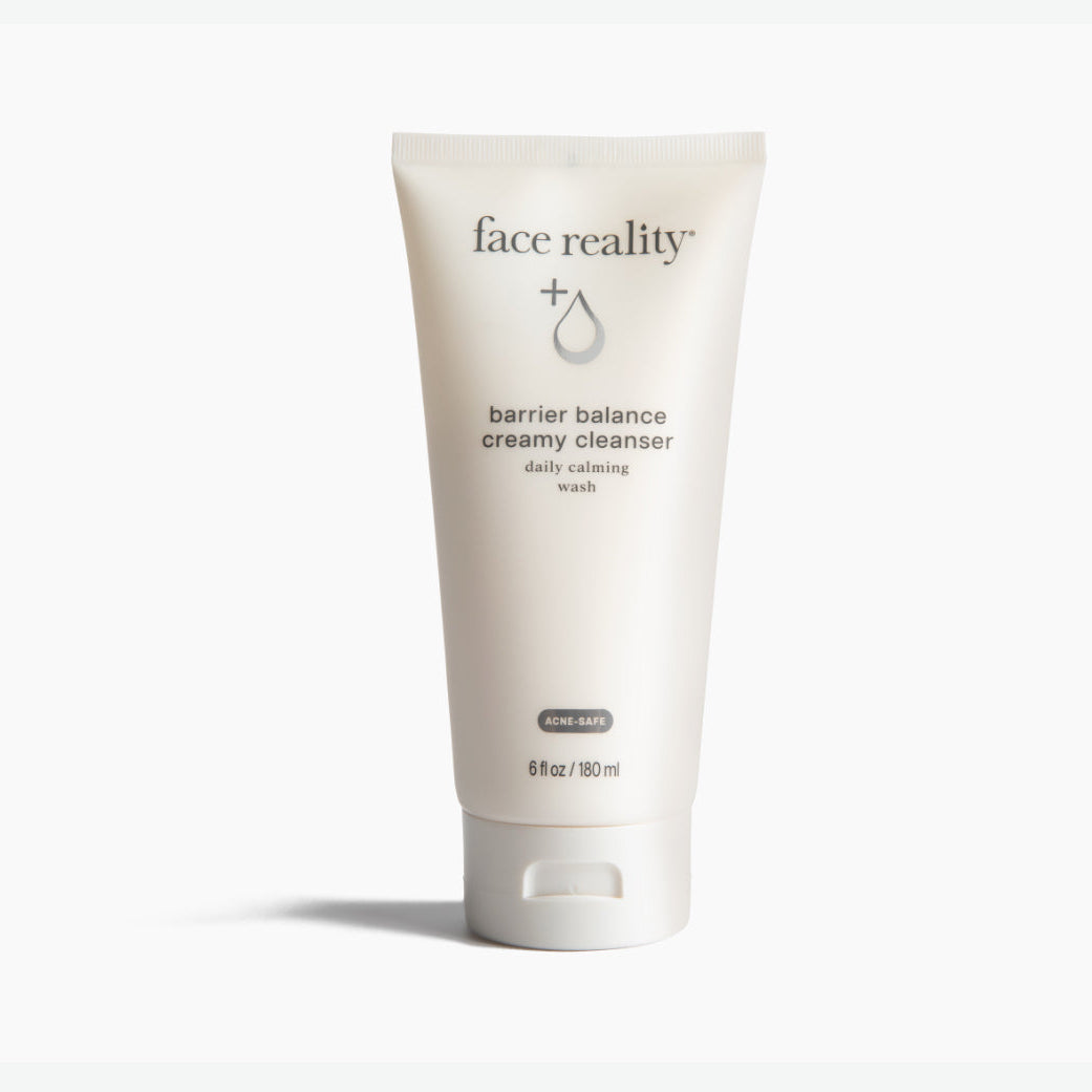 Tube of 'face reality' barrier balance creamy cleanser on a white background
